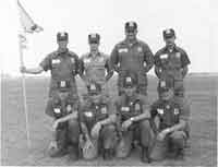 Jeff Lear holding the guidon.
